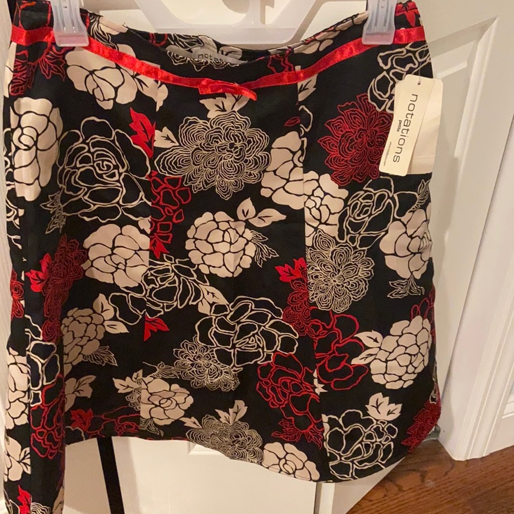 Nwt black skirt with red and creme flowers